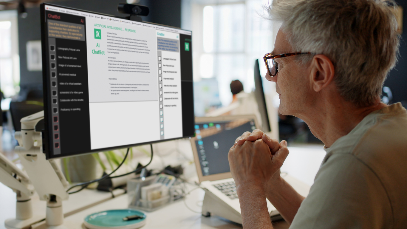 An AI Developer Uses Information Processing Theory to Design a Chatbot on a Monitor.