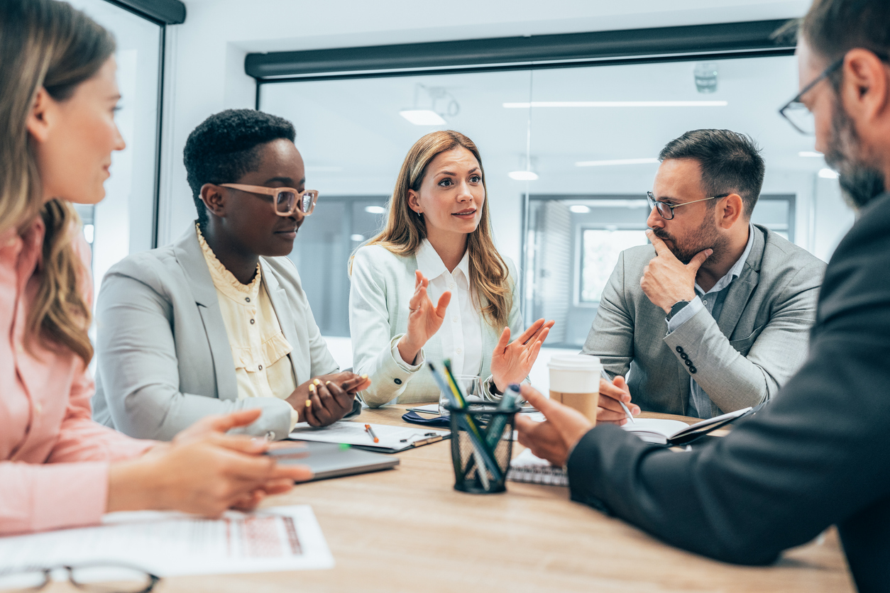 Professionals in a Business Meeting in a Conference Room.
