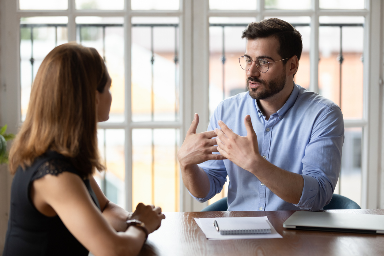 A Human Resources Manager Talks to an Employee.